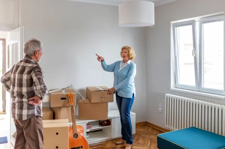 Happy couple after move Happy couple after move